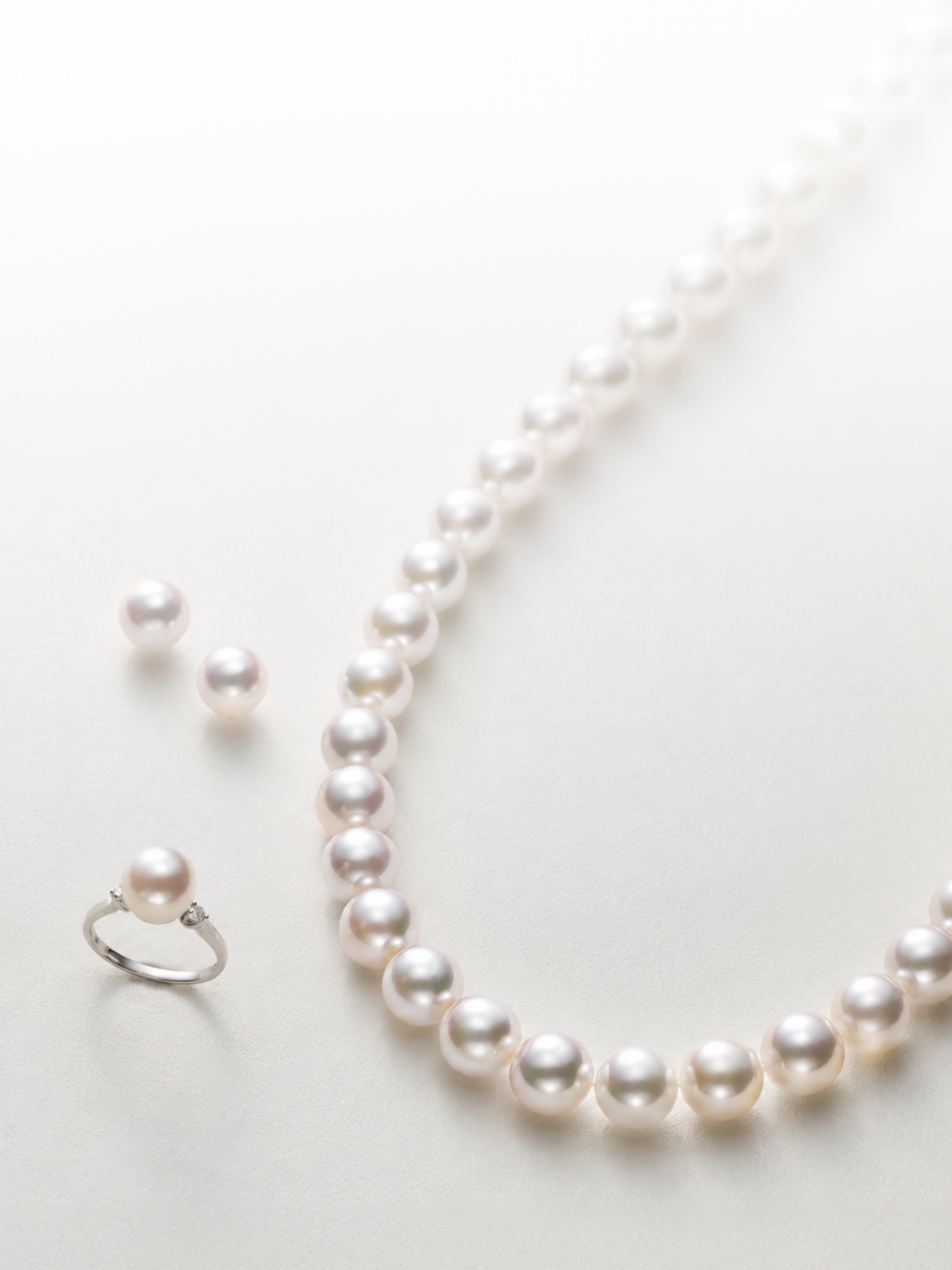 Akoya pearl necklace, earrings and ring